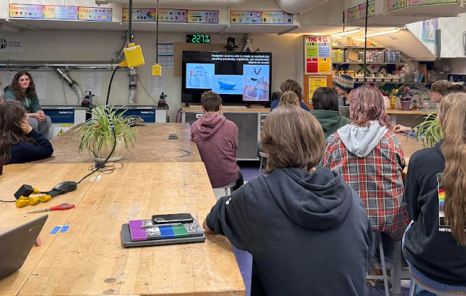 Students watch the presentation in their 7th period.