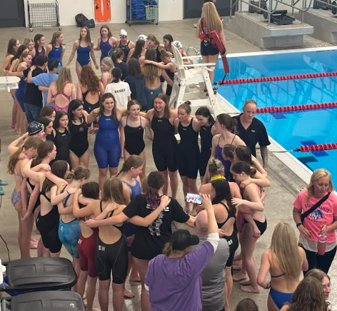 The League team huddle