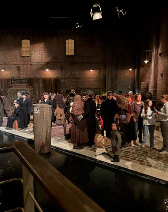 A mixture of wax and real people at the Emigration Center.