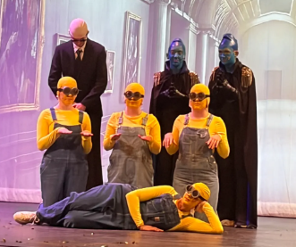 The Minions, Pitbull, and Megaminds pose.