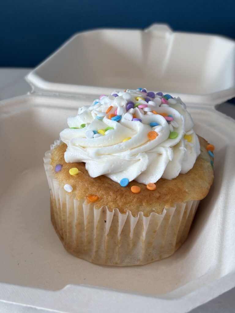 Vanilla cupcake with sprinkles