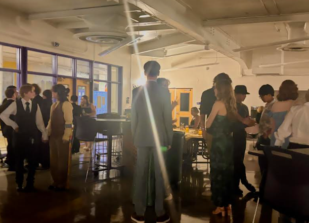 Students gathered in the cafeteria to socialize.
