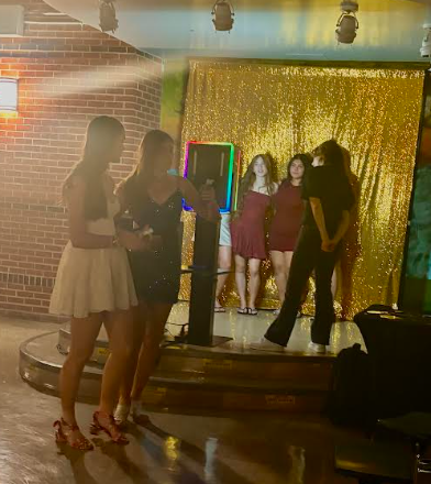 Posing for the golden photo booth.