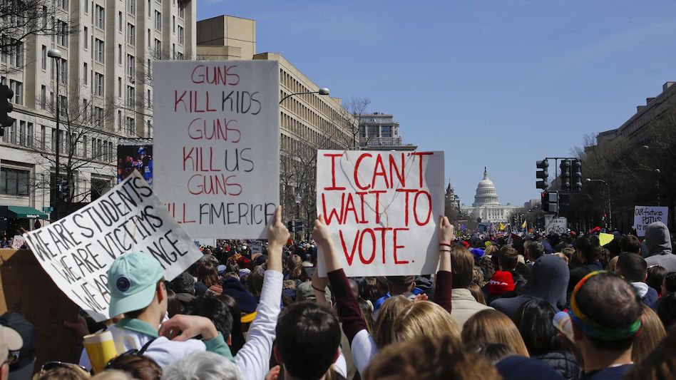 Students march in a protest demanding to lower the voting age
