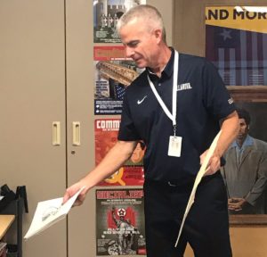 Mr. Burdick throws away his old files from his teaching career