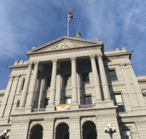 The Colorado State Capitol displays a pride flag