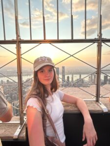 Kadence Poses with Building