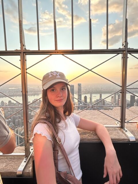 Kadence Poses with Building