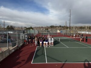 LHS girls tennis team does their team cheer