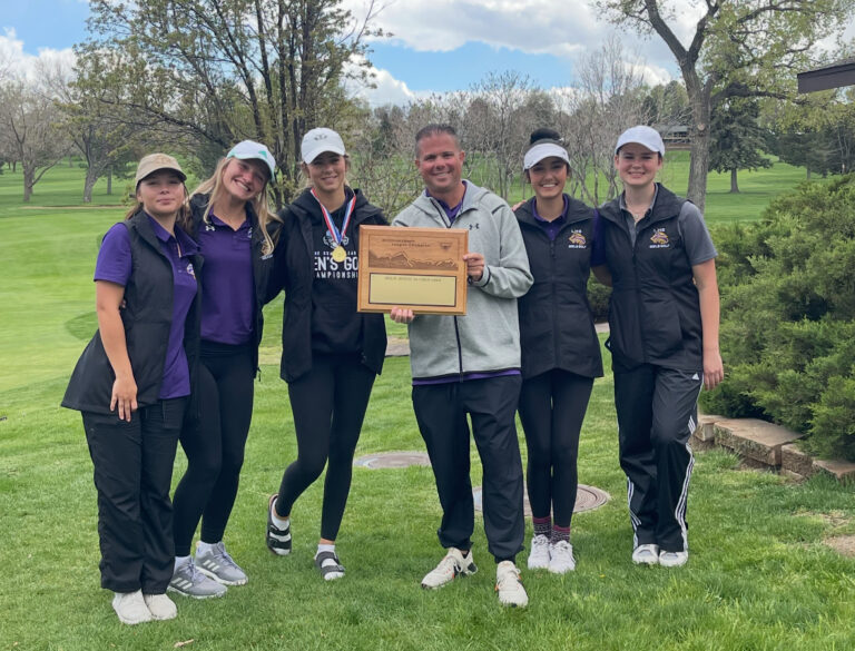 LHS Girls at League and Coach Prince