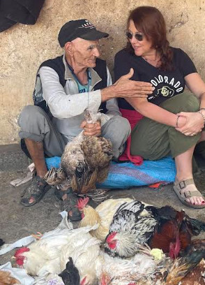 Dr. Rubin with a chicken farmer in Fez, Morocco