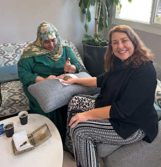 Dr. Rubin getting Moroccan henna