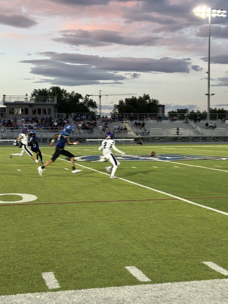 Player #2 senior Connor Pollock pursuing the ball.