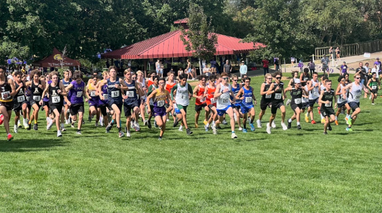 Littleton takes the lead in the Boys Varsity race